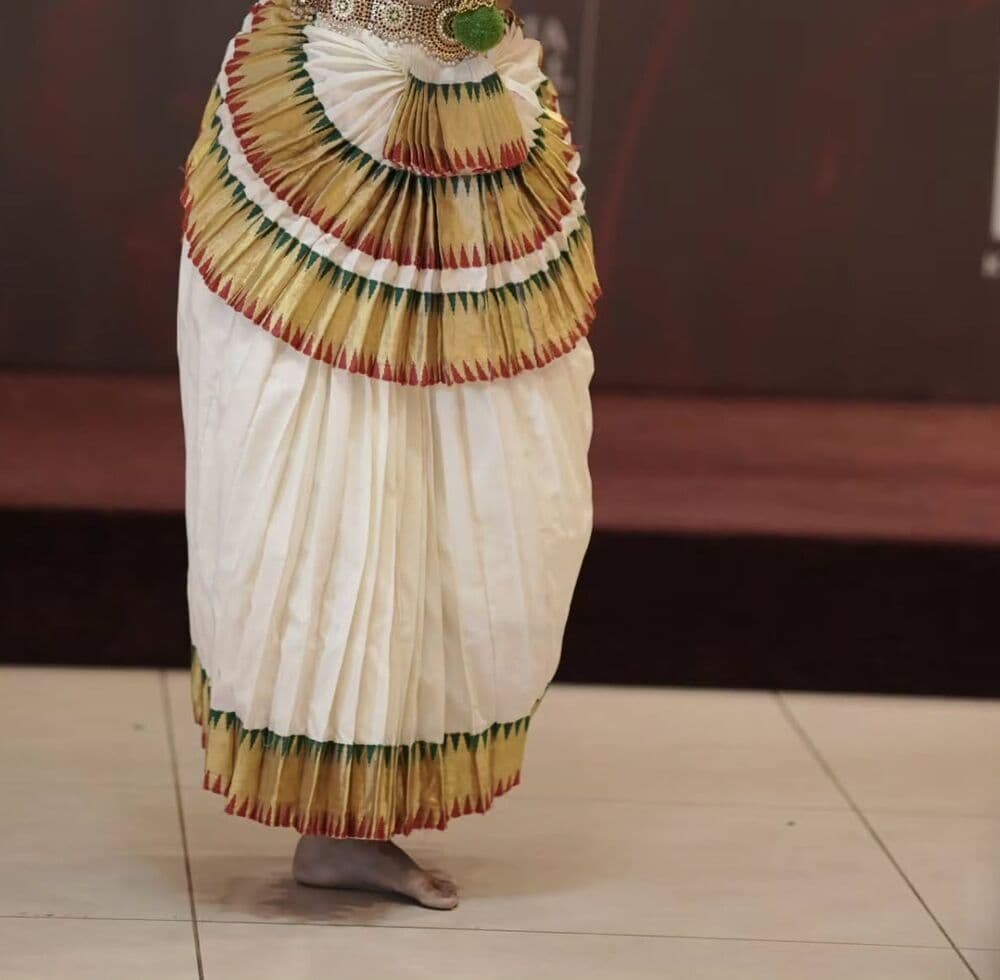 The pleated white and gold kasavu of a Mohiniyattam costume